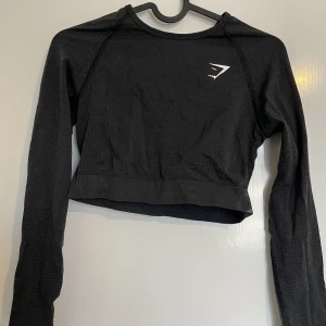 Gymshark crop top seamless 2.0 - Träningströja med märket gymshark