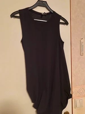 Klänning - Klänning som är begagnad och stretch 