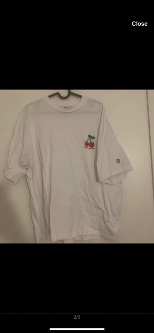 District 46 Topp - White tshirt from district 46. Slight mark on neck but not super noticeable 