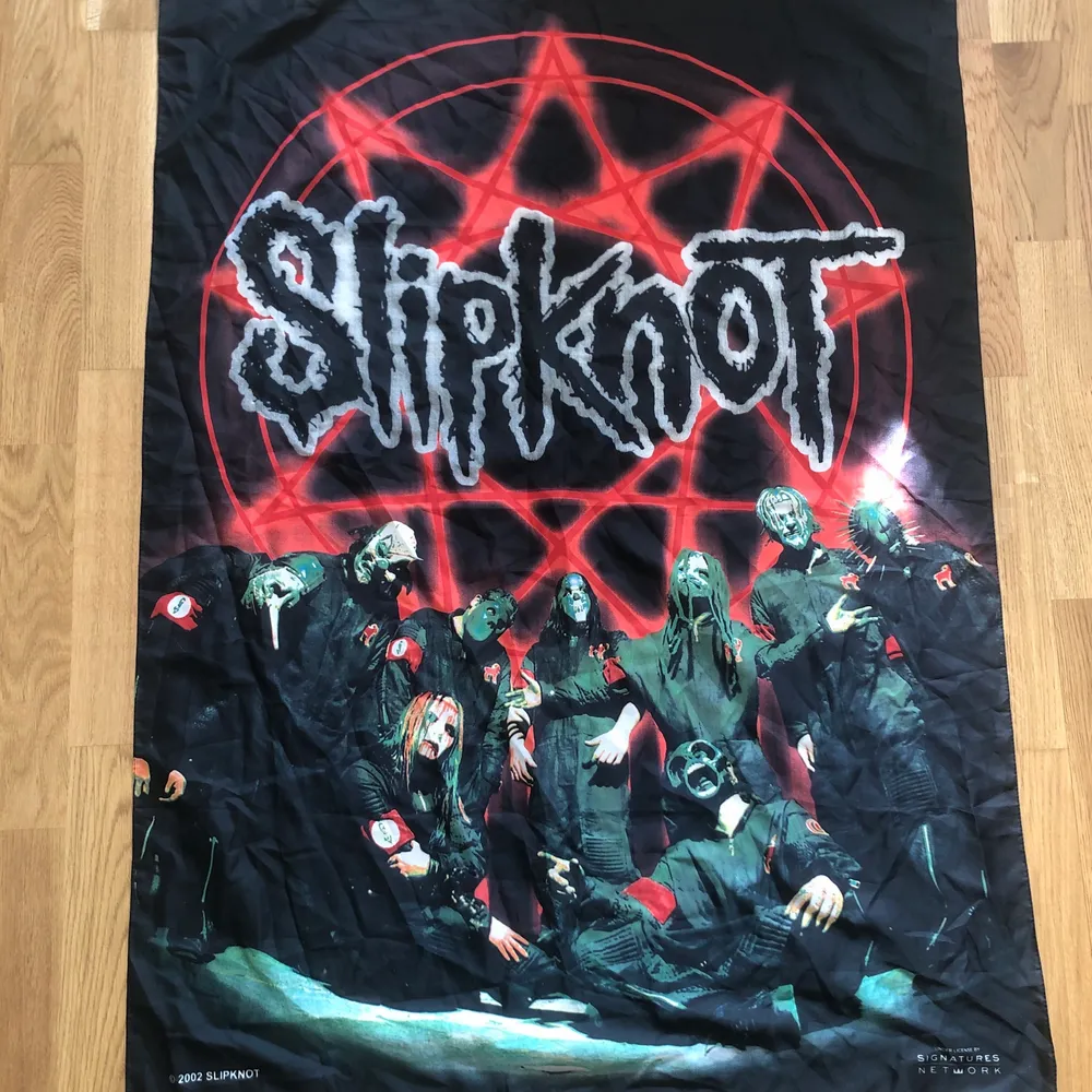 Flagg-affisch med Slipknot-motiv. Övrigt.