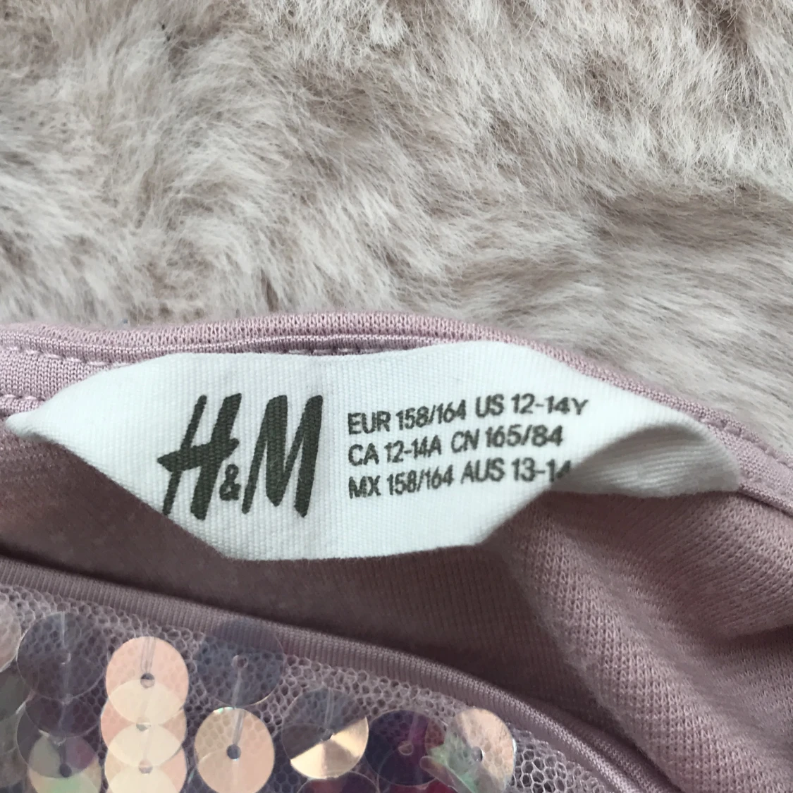 Rosa klänning med paligetter  - 91