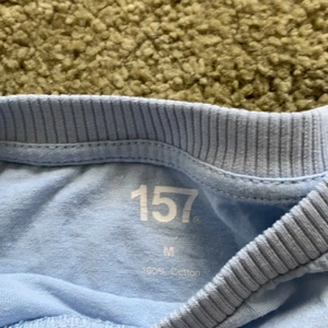 T-shirt  - Blå T-shirt från lager 157!