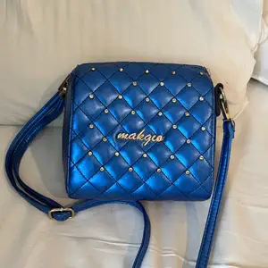 blue rheinstone bedazzled bag from humana in perfect condition 