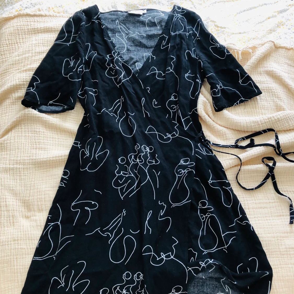 Söt omlottklänning