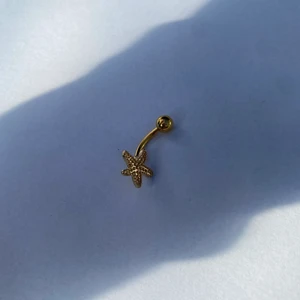 Navelpiercing - Somrig navelpiercing, aldrig använd! Nickelfri🔗