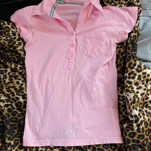 Rosa polo - Rosa polotröja som sitter som en babytee 