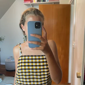 Rutig topp - Säljer nu min fina topp. Köparen står för frakt!