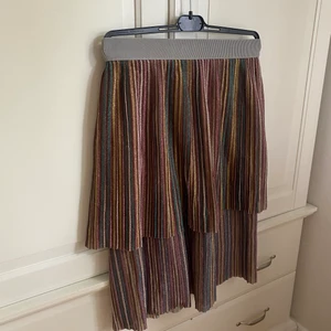 Glittrig kjol - Anv en gång 