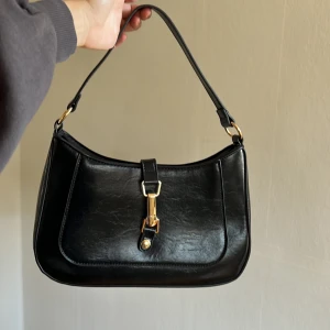 Väska - Ny skick! Köparen står för frakten!