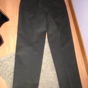 Byxor  - Fina byxor i fint fint skick. Storlek Xl. Står ej för frakt. 