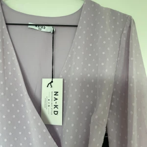 Långärmad klänning - Långärmad söt klänning från NAKD 