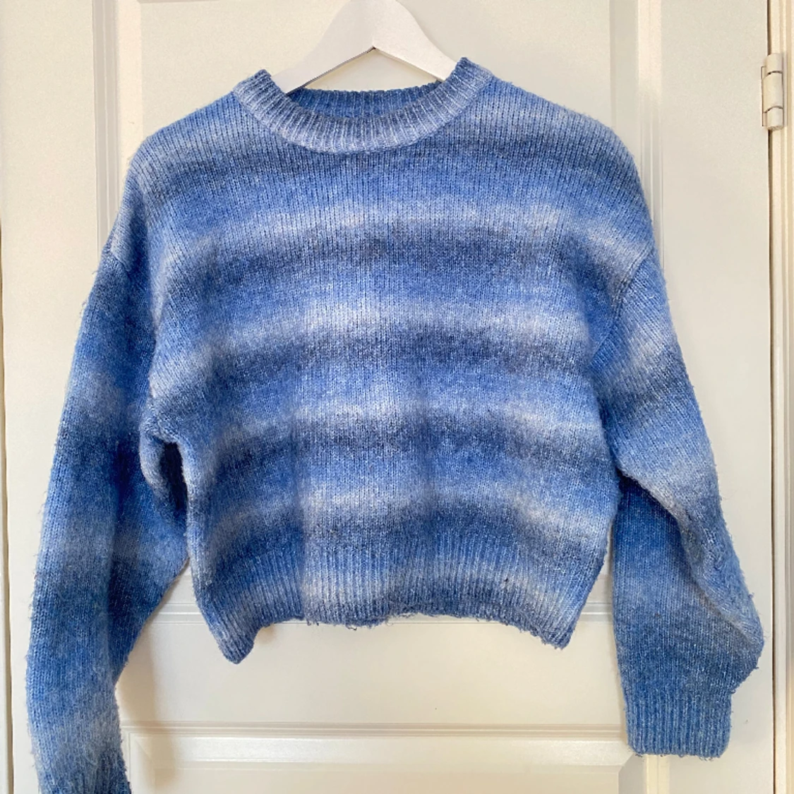 Blå stickad tröja - 90
