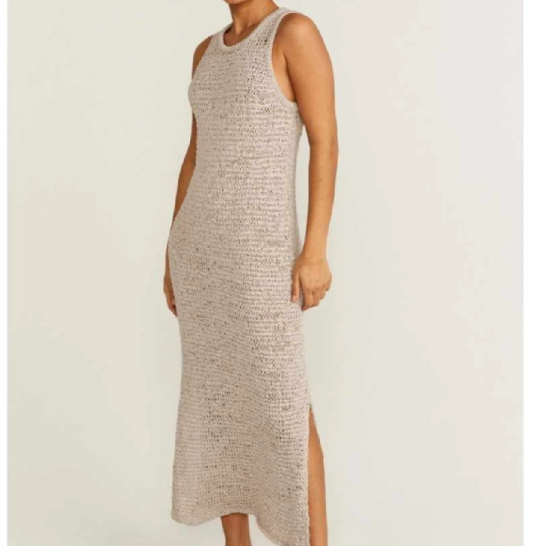 klänning från STOCKH ML STUDIO. 