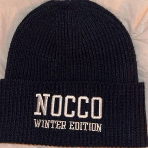 Nocco mössa  - Inte använd så mycket väldigt bra skick.