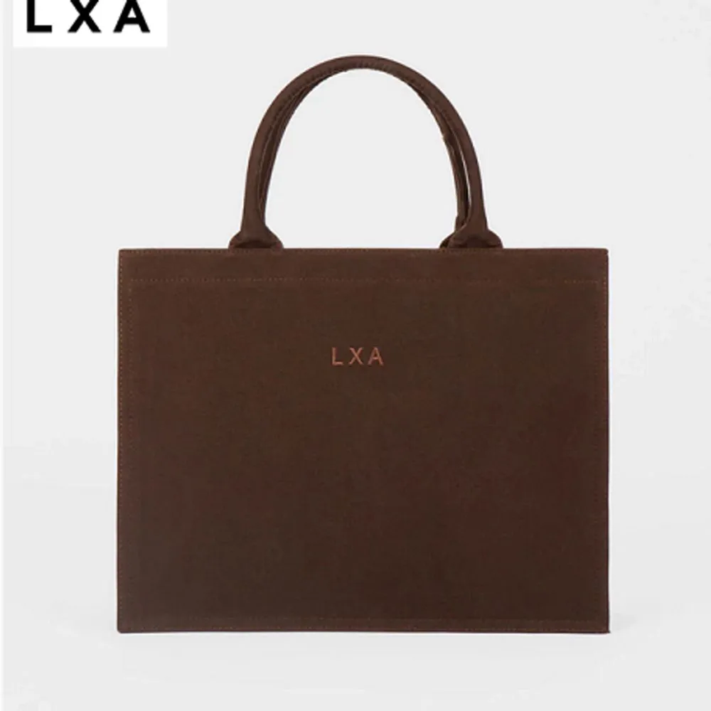Tote bag från LXA the lable. Använd en gång.. Väskor.