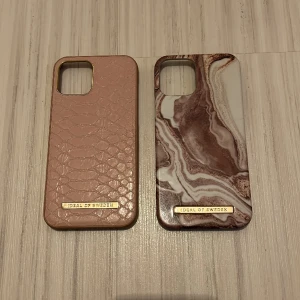 Ideal of sweden mobilskal - Säljer två stycken mobilskal från ideal of sweden. De båda är till iPhone 12. Endast använde någon enstaka gång. Säljer för 70kr/st eller båda för 130kr. Nypris: 299/st  FRAKT TILLKOMMER!  Skickar ENDAST i kuvert. 