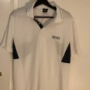 Stylish stretchy fit polo. Barely worn and in perfect condition. 