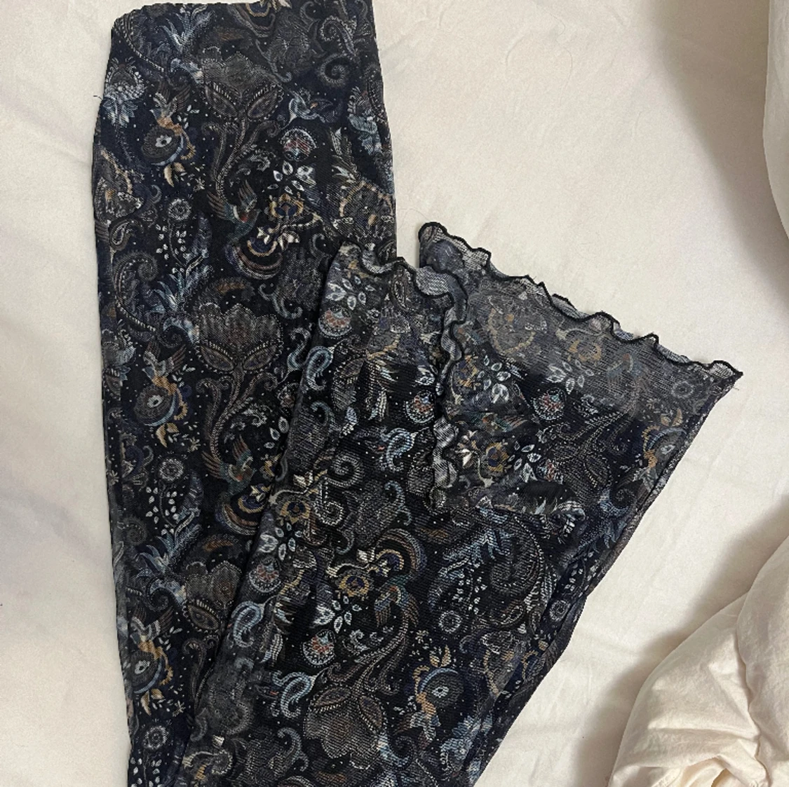 Utsvängda byxor - 90