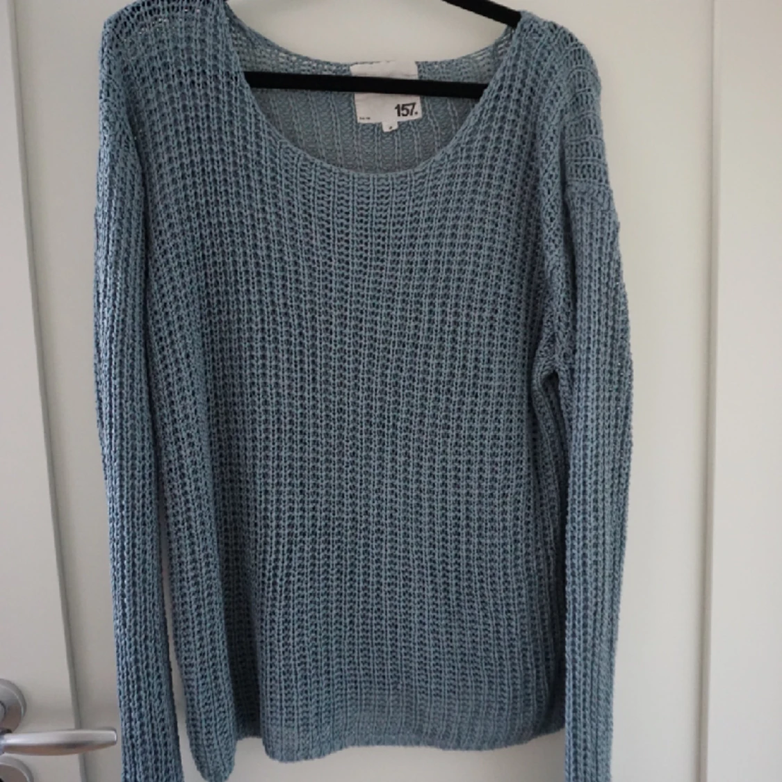 Blå stickad tröja 
