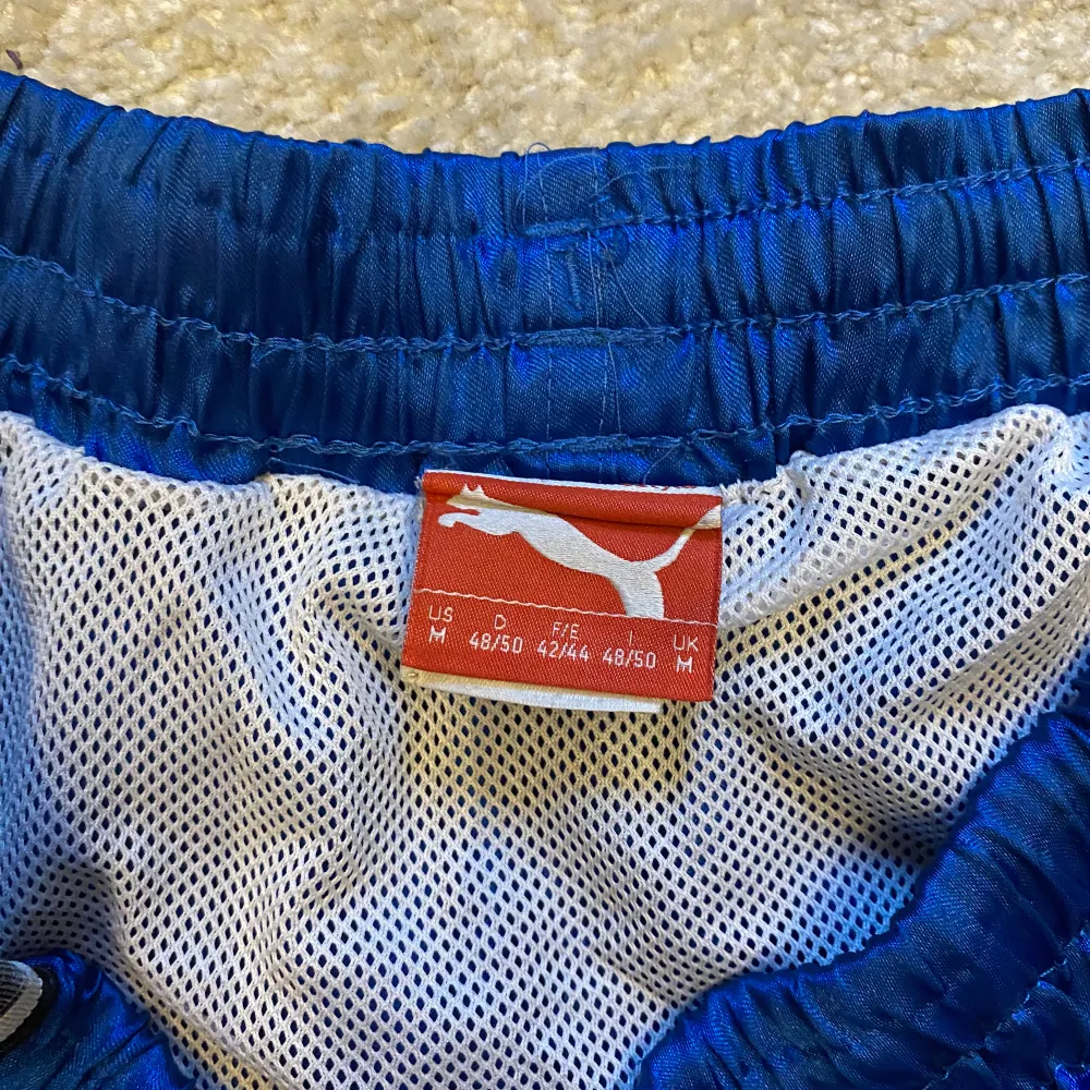 Gammla träningsshorts från Puma. En fin gammaldags model som fortfarande håller kvalite. Perfekt för träning och bad!. Shorts.