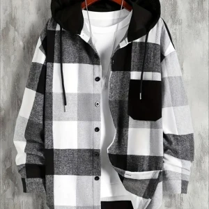 Svart/Vit rutig huvjacka - Garderob rensning! En rutig huvjacka otroligt skönt material med en svart baksida. Använt 1 gång sedan har den bara legat I garderoben.  100% Polyester