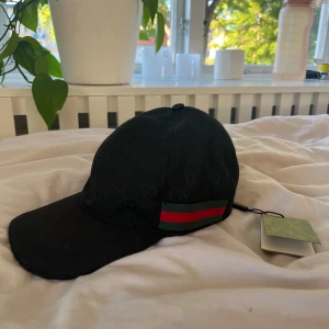 Gucci keps  - Oanvänd gucci keps, aldrig använd och har prislappen kvar 