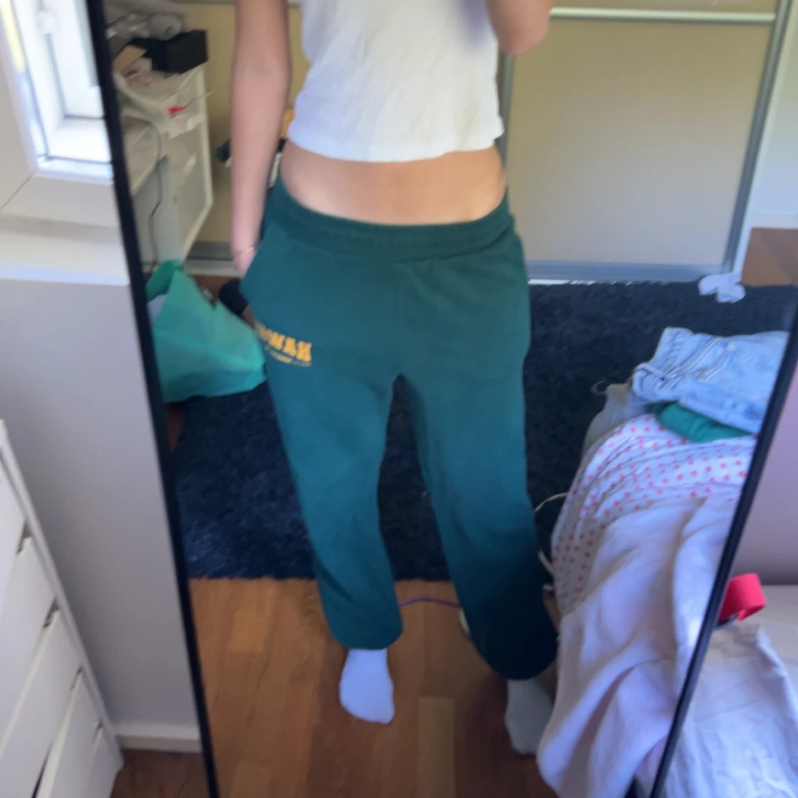 Green sweatpants