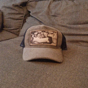 Maggiore-keps - Maggiore-keps.  Oanvänd, så gott som i nytt skick med andra ord. 