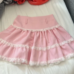 Rosa kjol - Rosa kjol i storlek xs