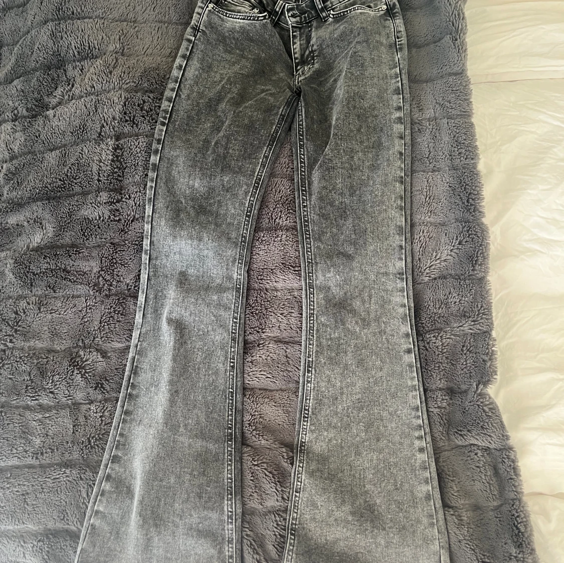 Low bootcut jeans  - 90