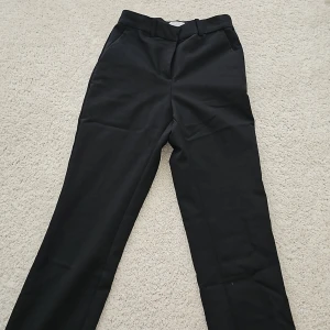 Kostymbyxor - Strl. 34