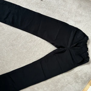 Costume pants - The item hasn’t been worn that much and has been taken care of very well. The clothing has no issues whatsoever and no damages. The item has also been cleaned very well so it’s not dirty or anything.