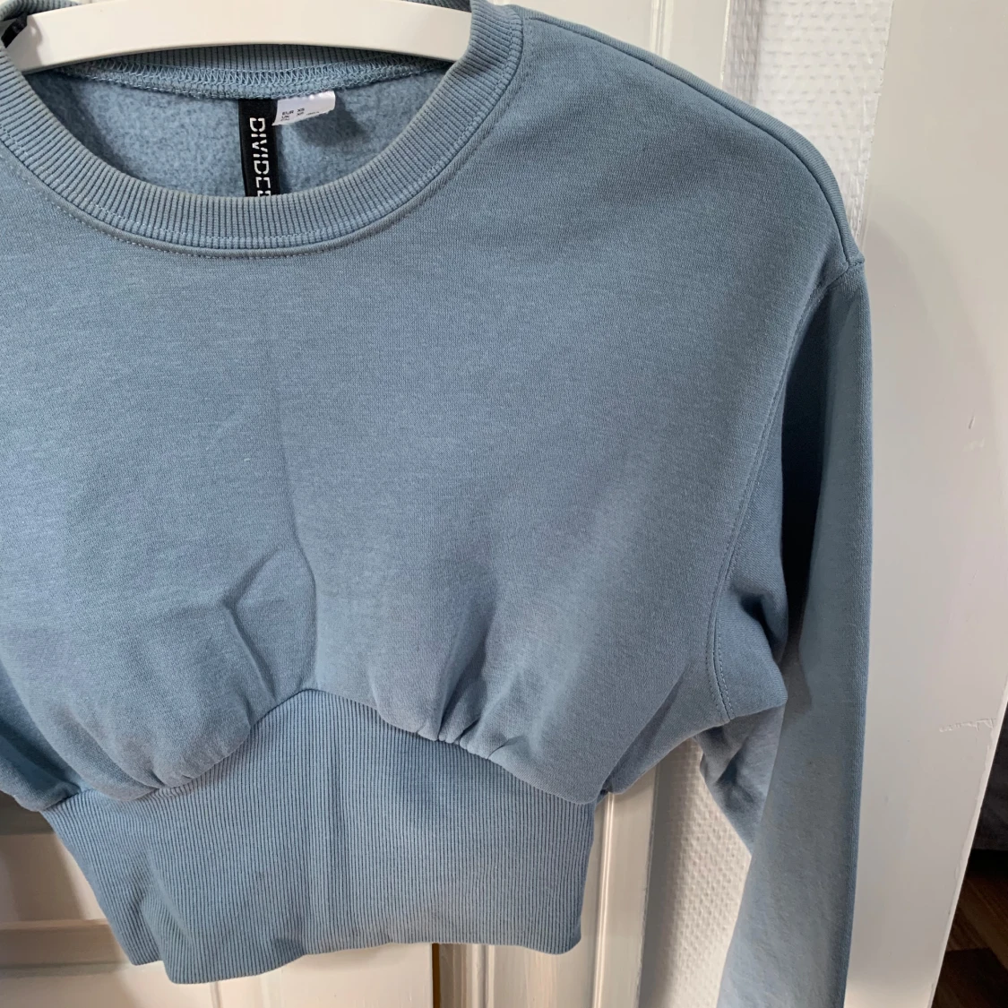 Ljusblå tröja - 90