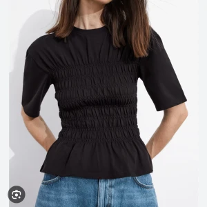 Smockad topp - Jättefin, passar M också.  Slutsåld. 