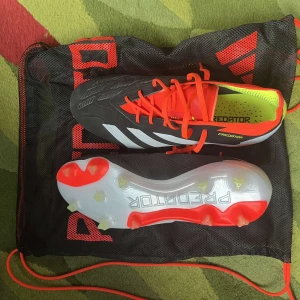 Adidas predator elits fg solar energy - Skick - 9,7/10 använda 1 träning  Påse ingår Ingen box Storlek 42 Tveka inte på att höra av dig för frågor👍