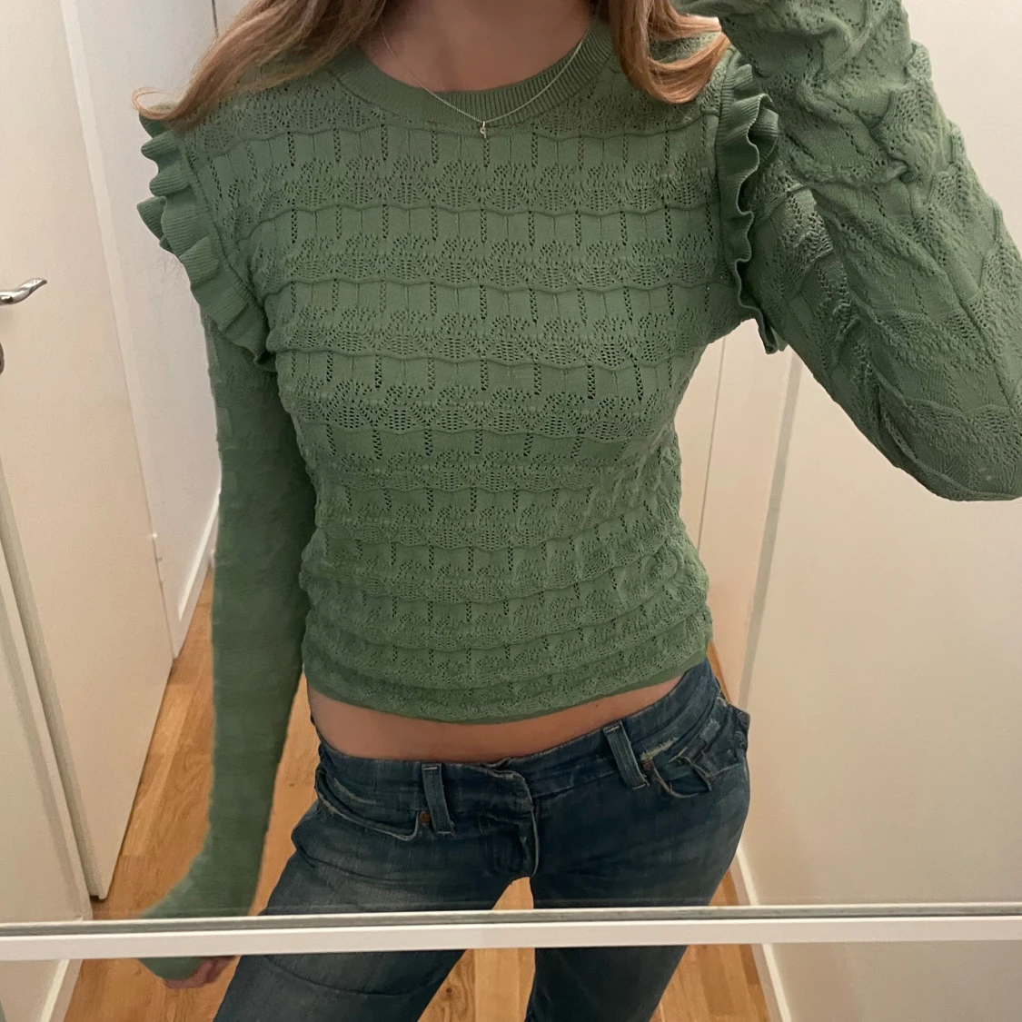 Grön stickad tröja