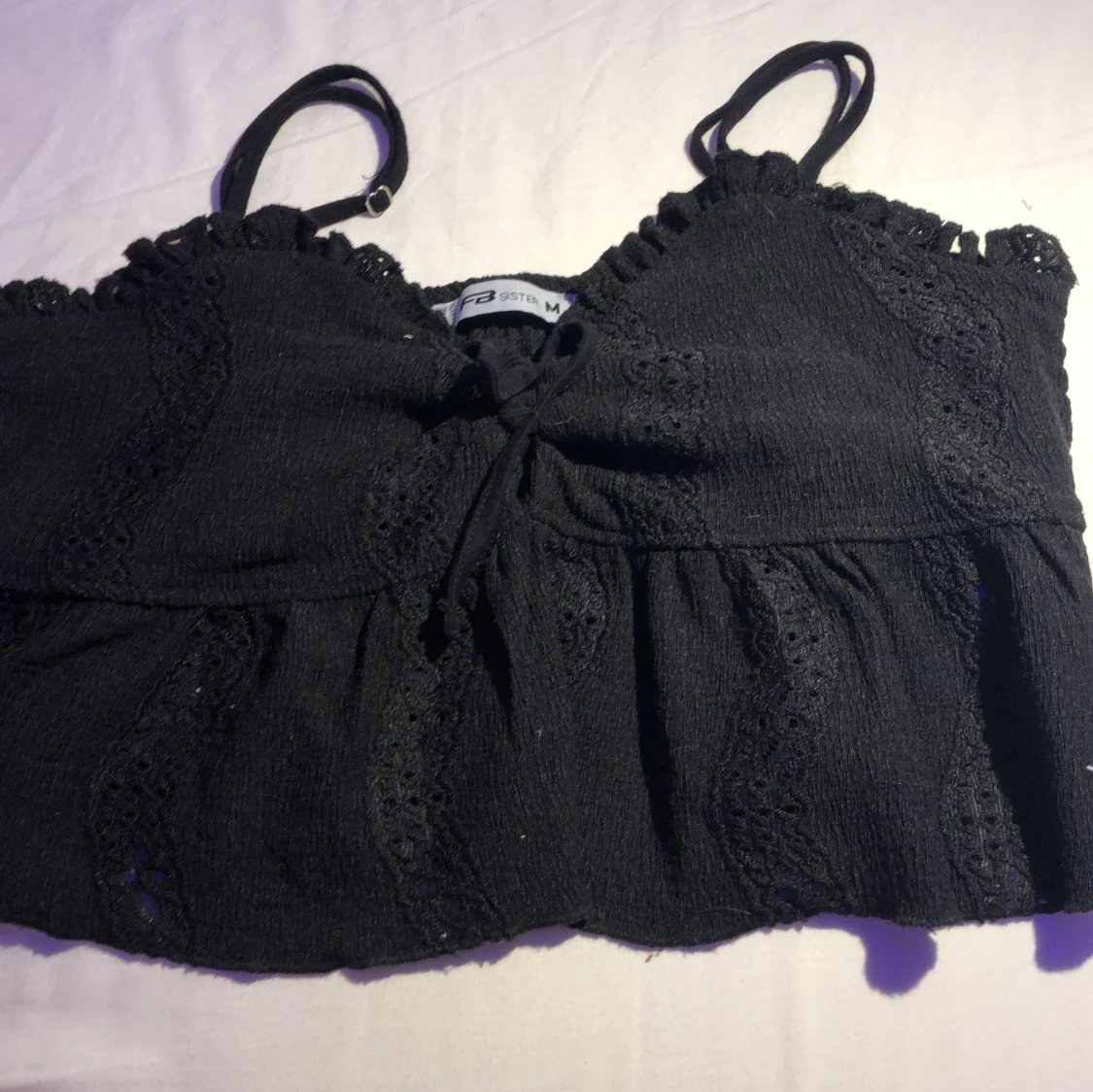 Svart blusaktig topp