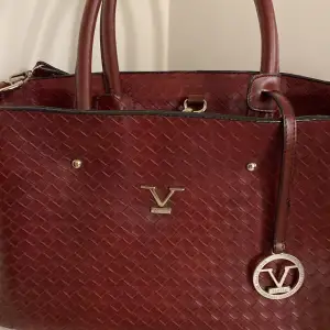 Beautiful and classic  Versace bag . Used only few times 
