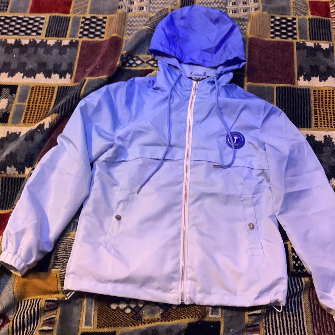 Trastar jacka ljusblå