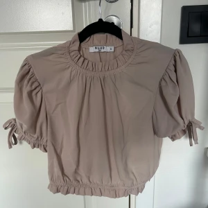 Blus - Använd endast 2 gånger. 