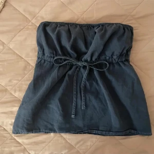 Bandeutopp brandy Melville  - Superfin bandeutopp från Brandy Melville i bra skick! Använd ett fåtal gånger.🥰🤗