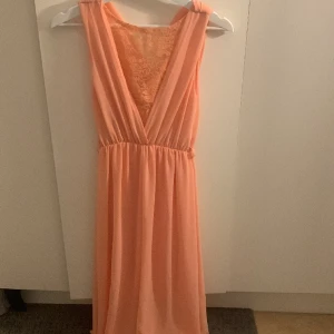 Rosé klänning  - Knappt använd