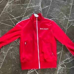 Palm angels röd track jacka - Skick väldigt bra storlek S 