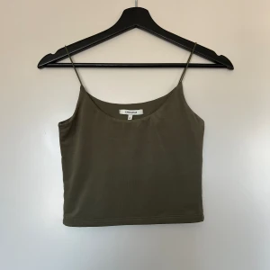 Chiquelle linne  - Grön topp. Bra skick 