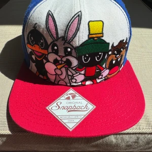Snapback keps, Looney tunes - Original Snapback keps, Looney tunes, i mycket fint skick.   Justerbar