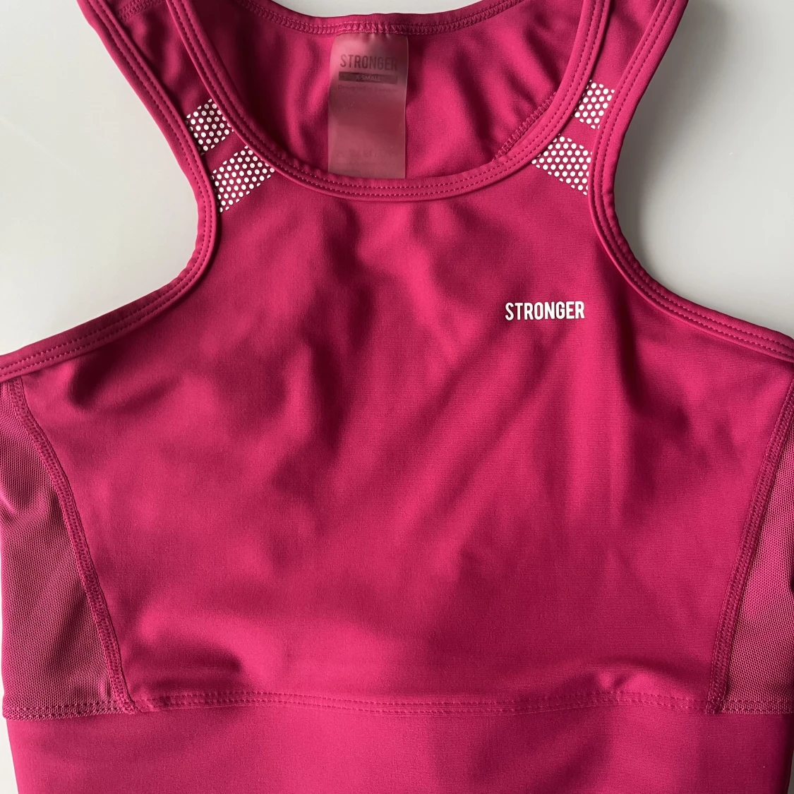 Rosa träningslinne, STRONGER, storlek XS