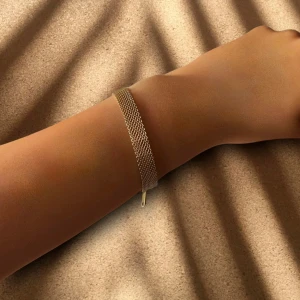 X länk armband rostfritt stål - Armband i rostfritt stål doppat i 18k guld. Vattentät och justerbar storlek.