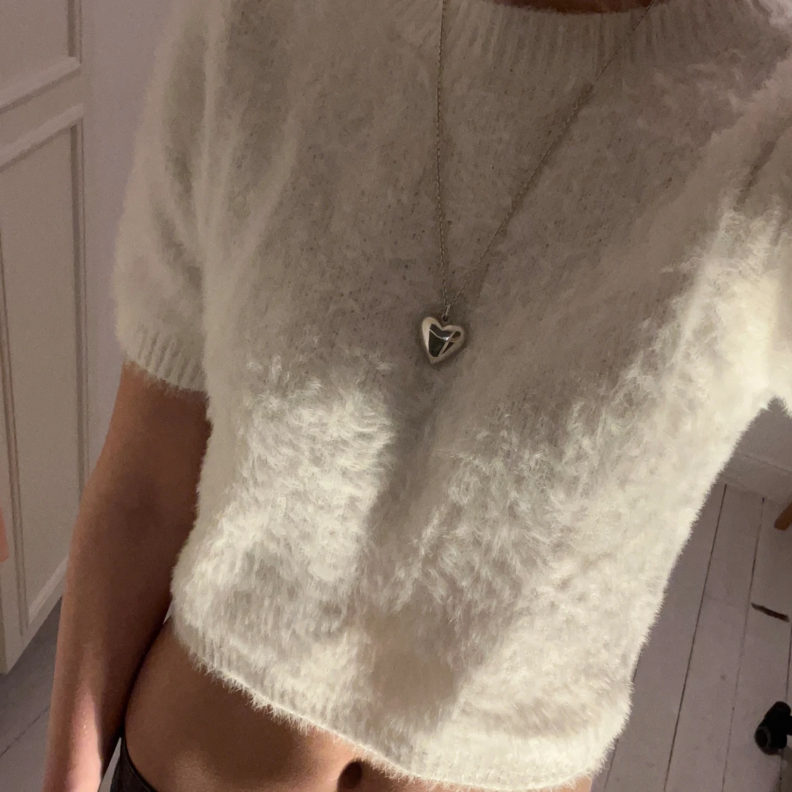 Vit kortärmad stickad topp