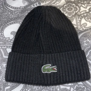 Lacoste mössa  - Helt ny