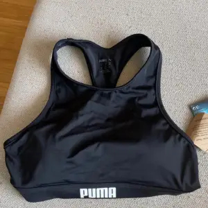 A puma sports bra, never used and still has the tag on!